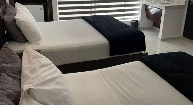 Standard quadruple chambre Hotel Rincon Real Suites