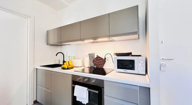 Апартаменты Moderno Bilocale con Terrazzo e Parcheggio