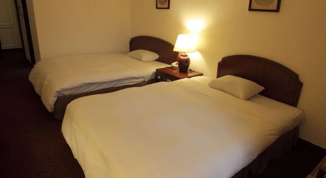 Четырёхместный номер Standard Nantou Hotel