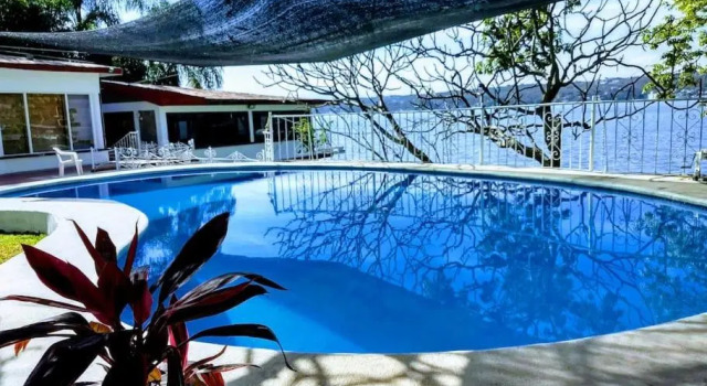 Апартаменты Habitación independiente a pie del lago con AC