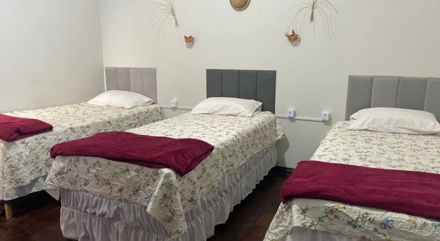 Кровать в общем номере Açaizeiro Hostel