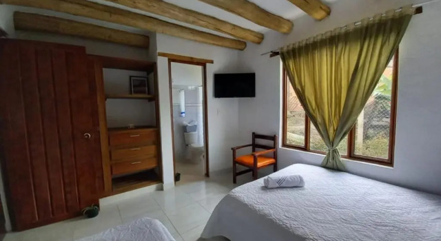 Tres habitaciones en la cabaña Quinta Buenos Aires, Prenota Hotel Hotel a Boyacá con parcheggio, Parcheggio