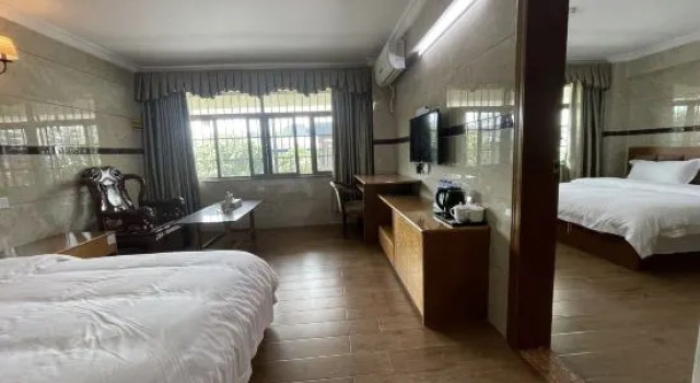 Семейный люкс Zhuhai Shenghuang Business Apartment (Tangjiawan University Town Jinding Branch)