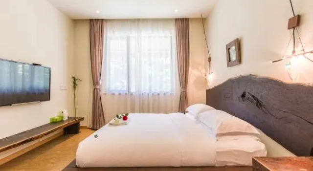 Семейный люкс с 2 комнатами Nianhua Boutique Hostel
