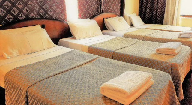 Четырёхместный номер Standard Abasto Hotel