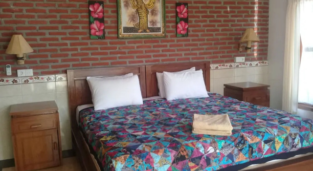 Двухместное бунгало Deluxe с балконом Eliska Sari Bungalows Sumberkima