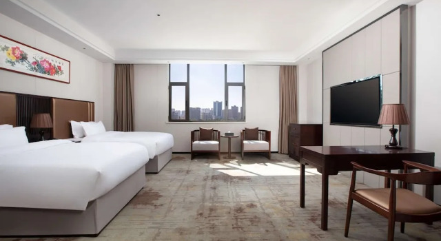 Четырёхместный номер Deluxe Ramada Encore by Wyndham Linqu Downtown