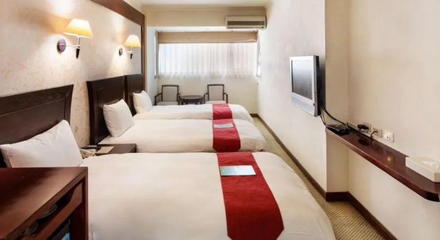 Трёхместный номер Superior Liga Hotel