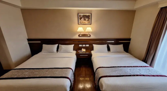 Четырёхместный номер Standard с балконом Cheng Pao Hotel