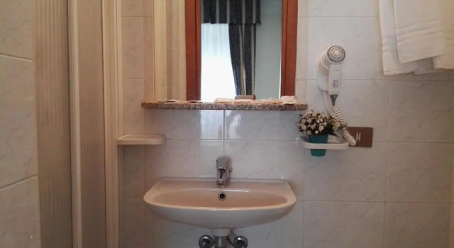 Трёхместный номер Hotel Loreto