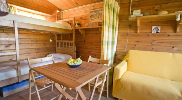 Seccione Chalet 1 Finnish pine cottage with outdoor area overlooking the sea-CHALET SECCIONE 1, Rezervovat Chata Chaty v Elba, Chalupa