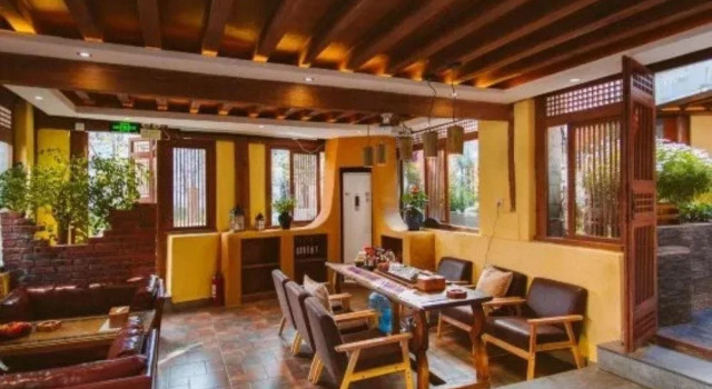 Lijiang Cbsi Living Style Inn, Prenota Hotel Lijiang Yunnan