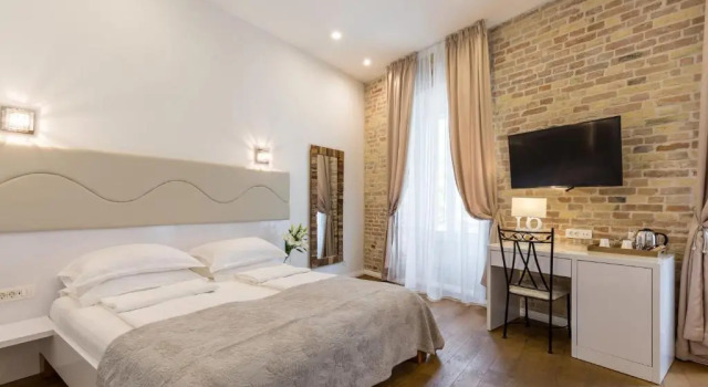 Номер Deluxe Pellegrini Luxury Rooms