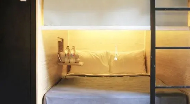 Кровать в общем номере My Studio Hotel Losari Makassar