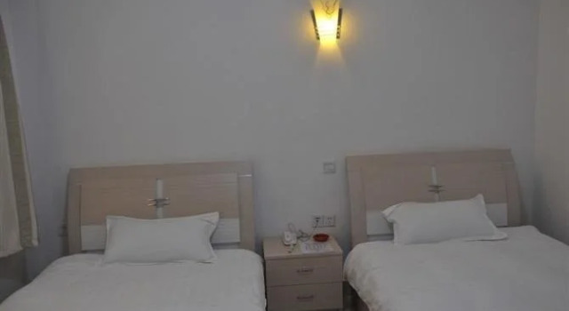 Heji Guiyuan Inn, Prenota Hotel Mianyang Sichuan