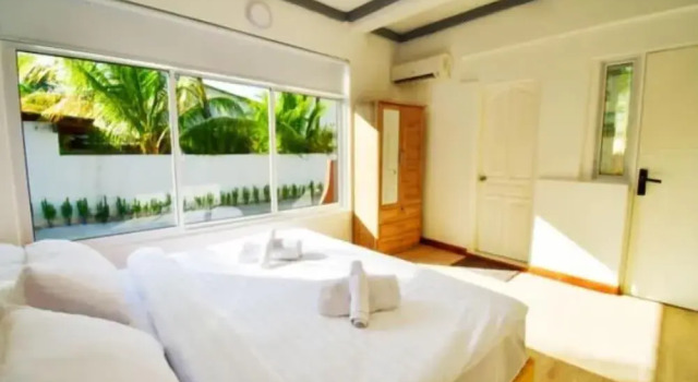 TWIN PALMS Surfhouse, Забронировать Отель Тулусду Атолл Северный Мале