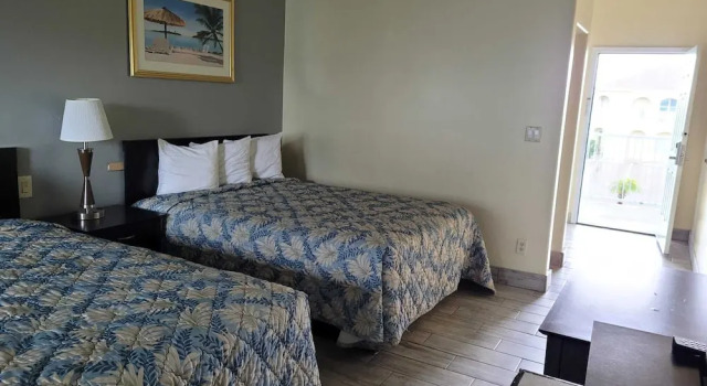 Casa Bella Hotel and Suites, Забронировать Отель Отели Саут-Падре-Айленд с парковкой, рядом с Andy Bowie Park, Парковка