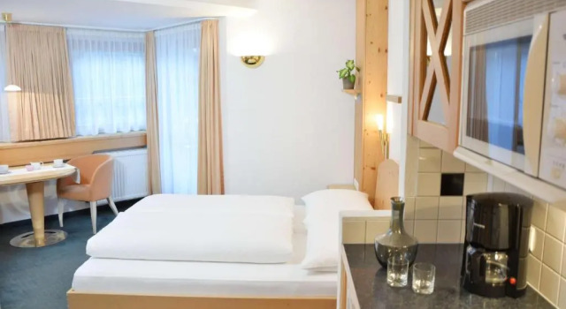 Студия Appartements Aurikel Corso