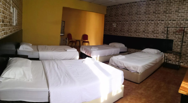 Семейный люкс OYO 90363 Nyamanya Inn
