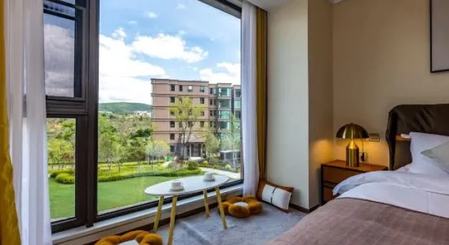 Люкс с 2 комнатами с видом на сад Youxi Resort Hotel (Fuxian Lake Cambrian Happy World）