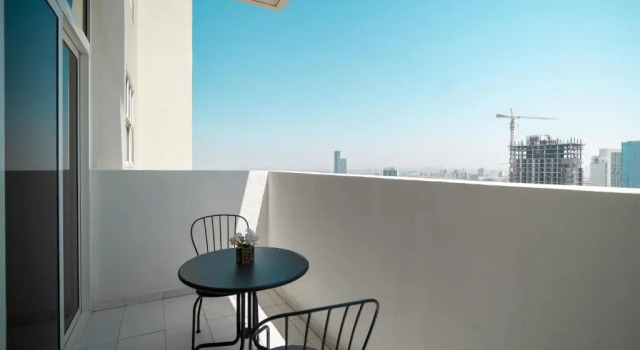 Студия HiGuests - Elegant Studio with Pool and Private Balcony