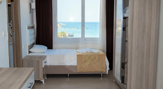 Четырёхместный номер Standard с балконом и с видом на море Seymen Hotel