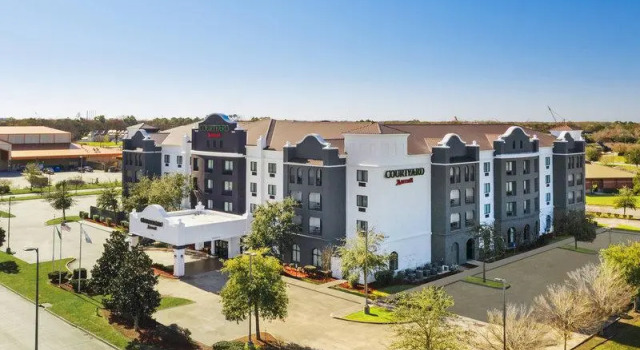 Кровать в общем номере Courtyard by Marriott Houma