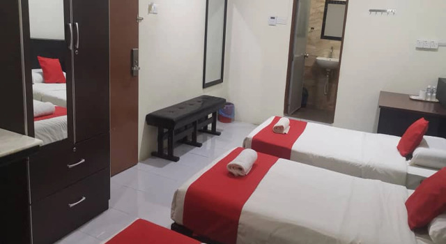Семейный люкс OYO 1104 Q Hotel