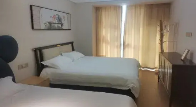 Семейный люкс с 2 комнатами с балконом и с видом на сад Yuexing Tinghuyuan Guesthouse