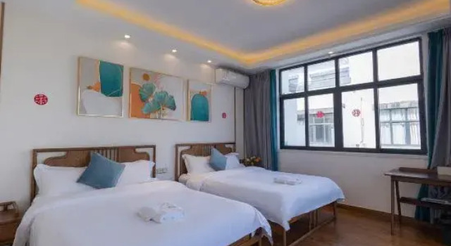 Кровать в общем номере Zhongyou Homestay