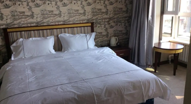 Harbin Shi Hai Zhe Ren Hotel, Varaa Hotelli Dao Wai 