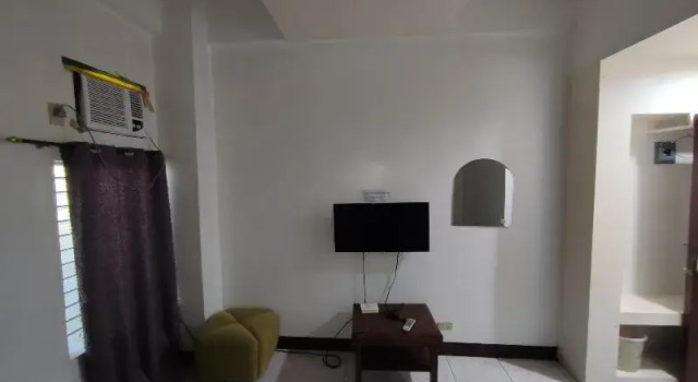 Двухместный номер Deluxe с балконом Green Ridge Apartelle