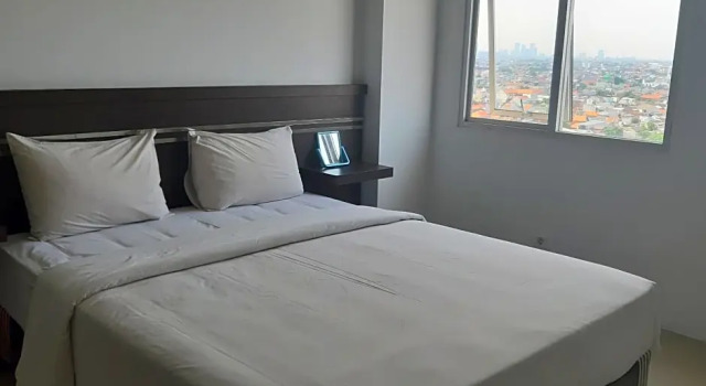 Люкс OYO Flagship 90087 Apartment Menara Rungkut 2