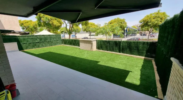 Апартаменты Apartamento diseño con jardín privado a 100 metros del mar