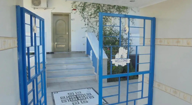 Апартаменты Цокольный этаж с 3 комнатами Kostas Family House