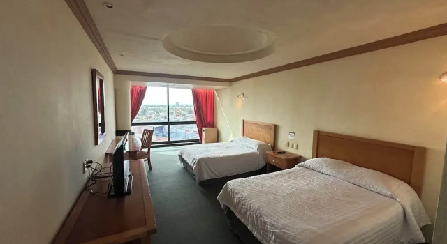 Четырёхместный номер Standard Hotel Florencia by Marho