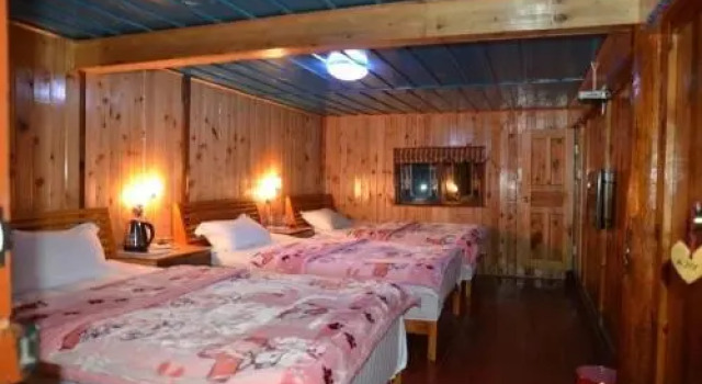 DiQing Shangri-La HaBa Snow Mountain Guesthouse, Забронировать Отель Шангри-Ла Юньнань