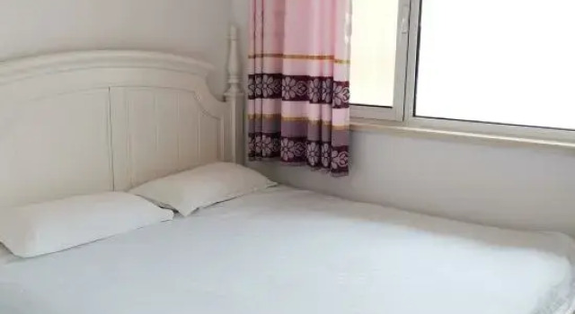 Люкс с 3 комнатами Qingdao Tianze Seaview Apartment