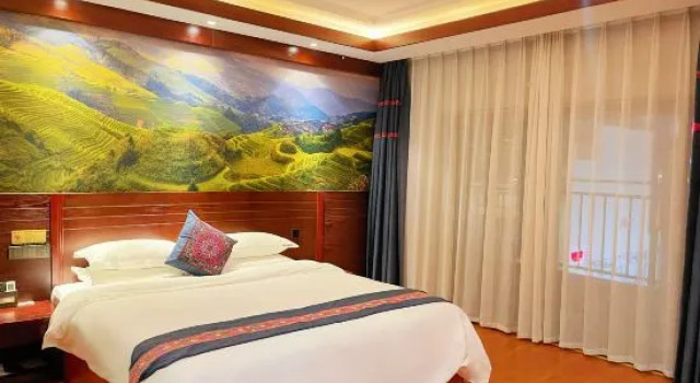 Люкс Mijng Qiyuan Minority Theme Hotel