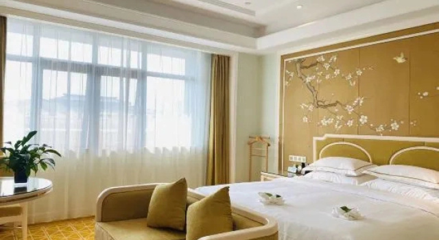 Люкс Fengxian Hotel (New District Bus Terminal Store)
