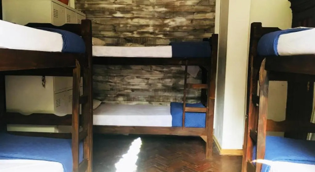 Кровать в общем номере Destino26 Hostel