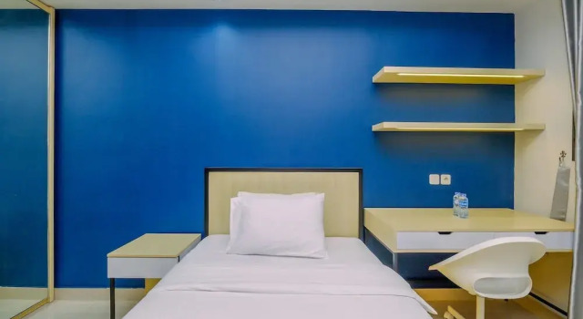 Comfy and Minimalist Studio with City View at Evenciio Margonda Apartment