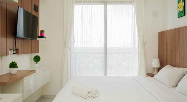 Well Appointed and Homey Studio Room at Sky House BSD Apartment By Travelio