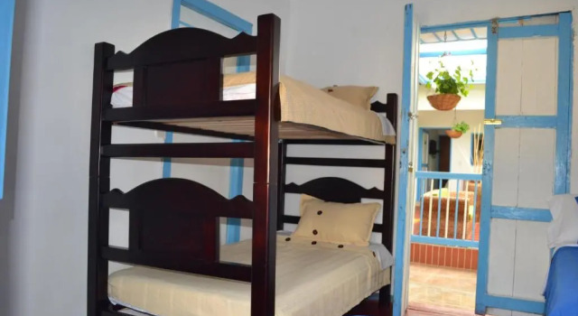 Кровать в общем номере Hostal Bosque de Niebla
