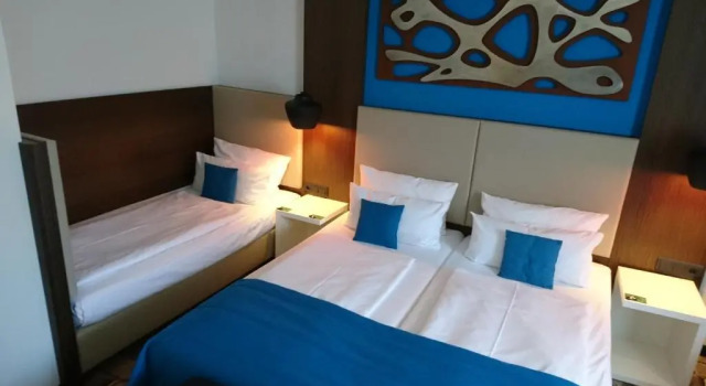 Трёхместный номер Superior Turm Hotel
