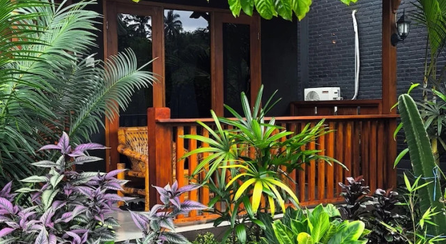 Двухместный номер Deluxe с балконом и с видом на сад Tetebatu Valley Bungalows