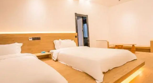 Трёхместный люкс Mogan· Yunlan Holiday Courtyard Boutique Hostel