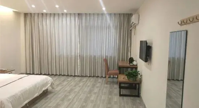 Люкс Deluxe Yuxiang Business Hotel