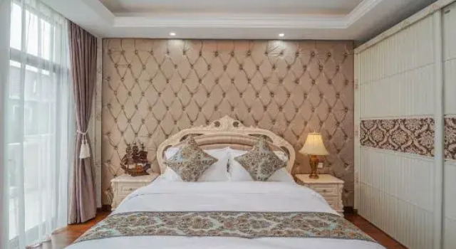 Кровать в общем номере XiuRong Manor