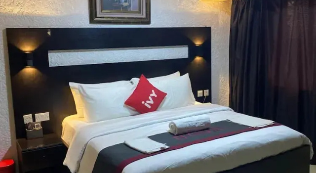 Exécutive chambre Aotel DawnCarrington Hotels & Suites